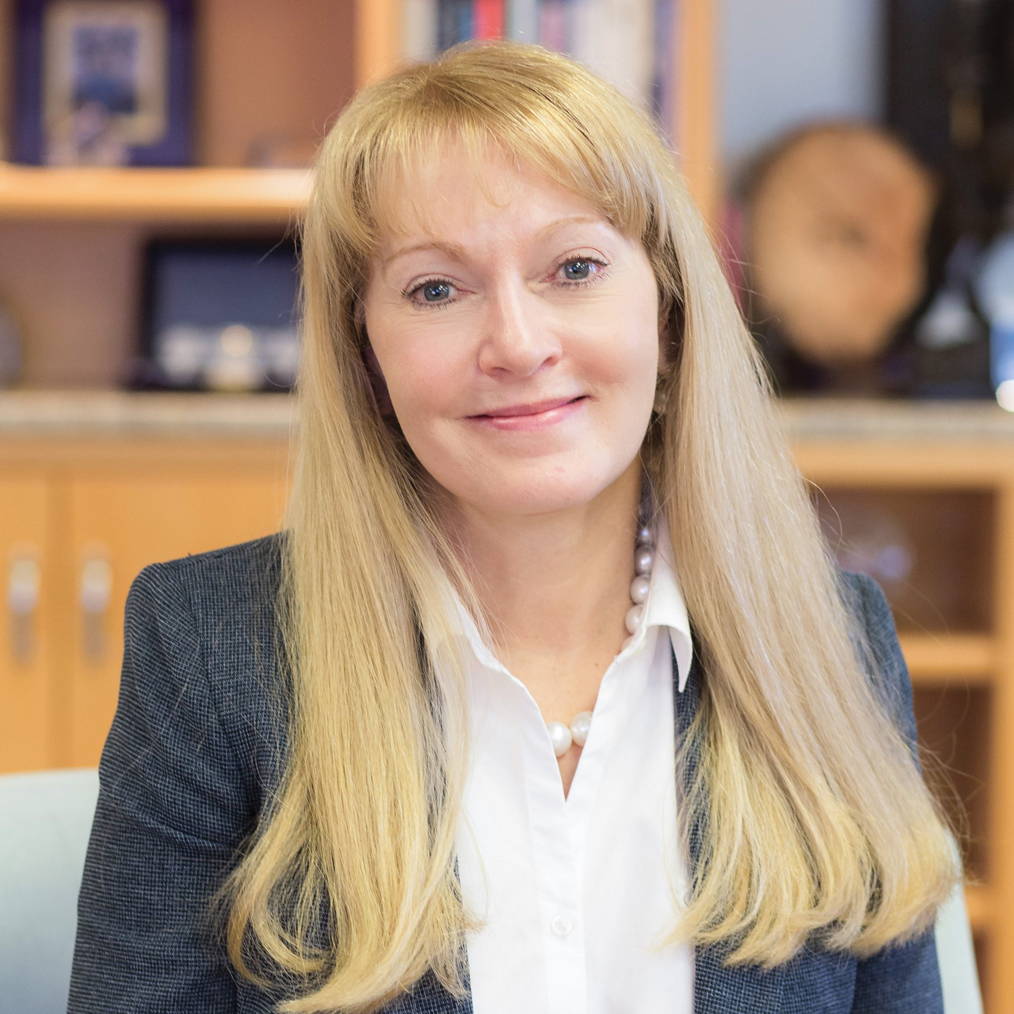 Karen Wright sits in her office