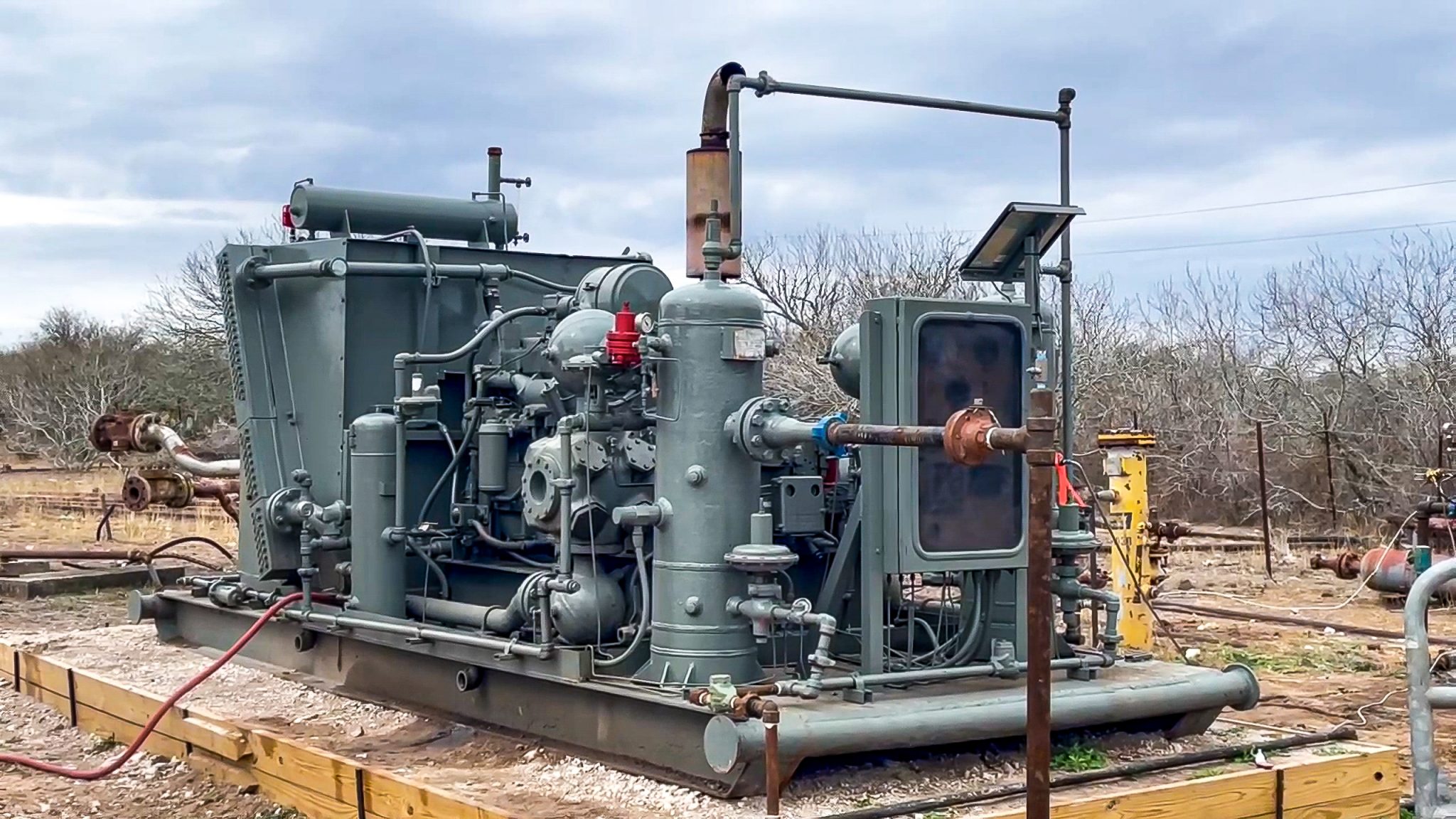 Serial No. 2 compressing gas in a field in Concepcion, Texas.