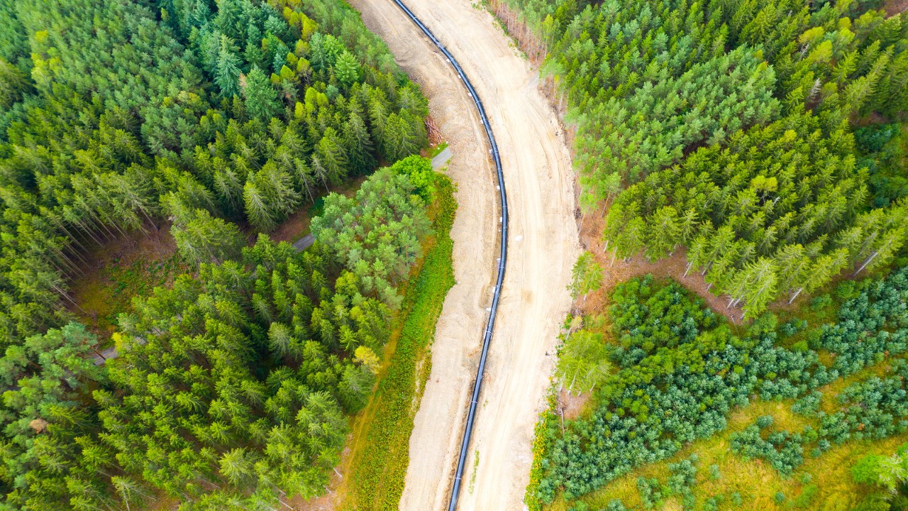 Construction site of Antelope gas pipeline. One part of Nord Stream 2 pipeline from Russia to European Union. Workers and cranes making new way for gas.