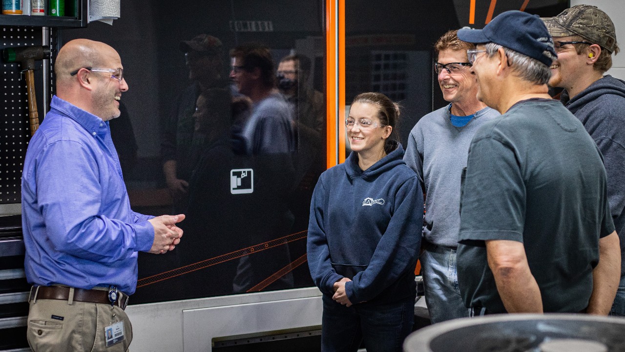 A group of students tour the Manufacturing facility