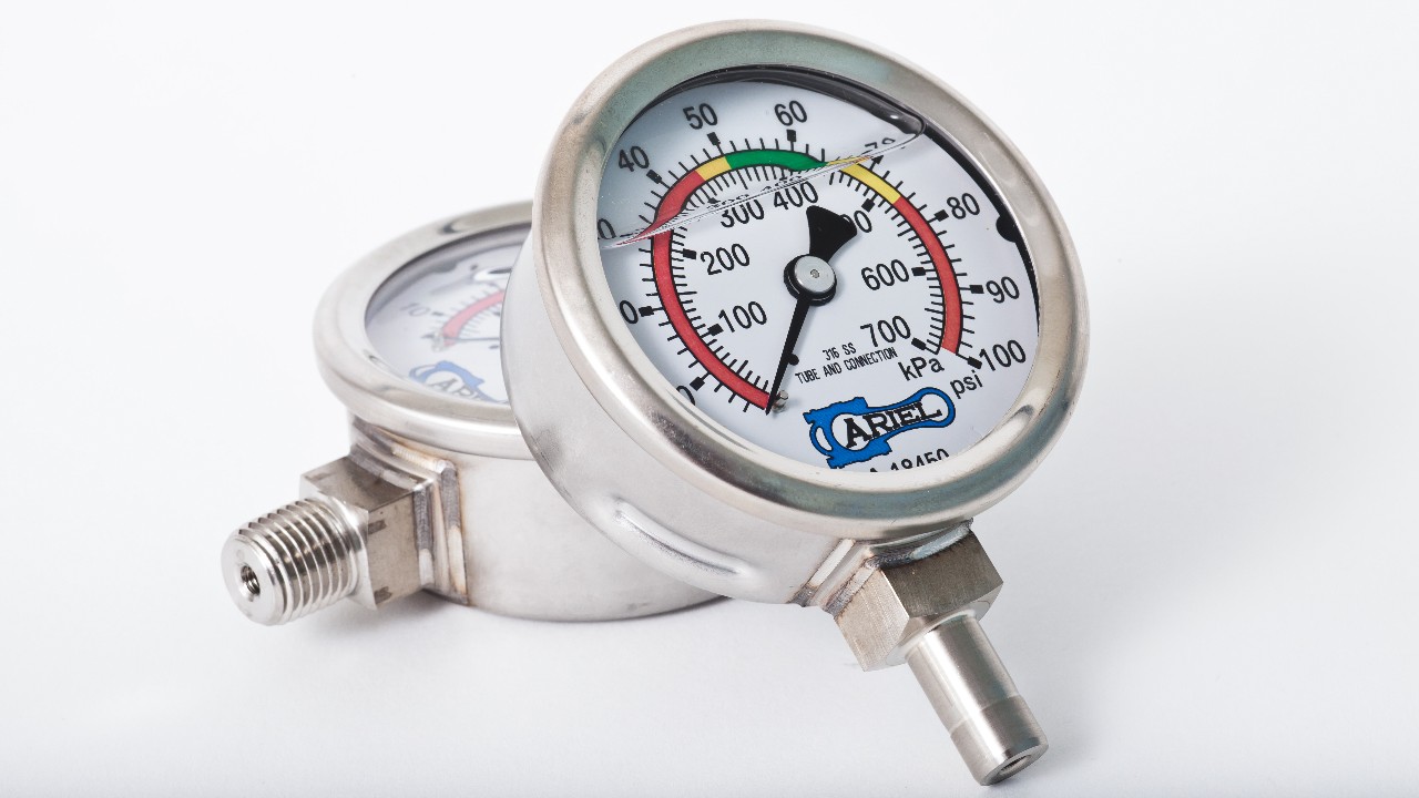 Two Ariel pressure gauges on a white background