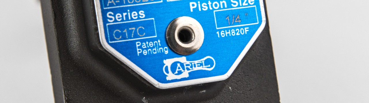Detail of the Ariel logo on one of the lubrication pumps