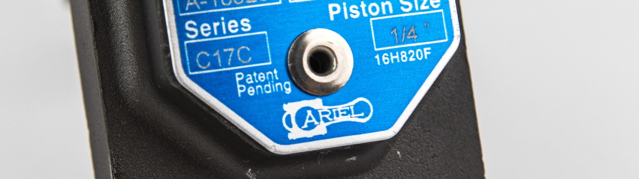 Detail of the Ariel logo on one of the lubrication pumps